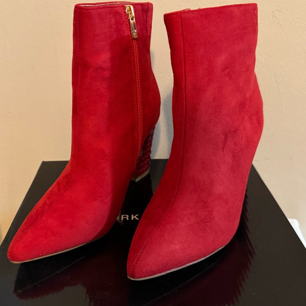 New York and Company red boots size 8.5 NWB. Never worn. Gold zipper.